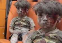 หดหู่!!เด็กซีเรียถูกระเบิด ใบหน้าอาบเลือด นั่งรอการช่วยเหลือด้วยความเศร้า
